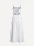 Back view of Marbella white linen dress with lace-up back detail – 100% Capri