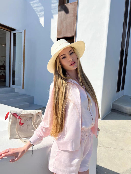 Panama Trendy 100% Capri pink and white straw hat worn by model