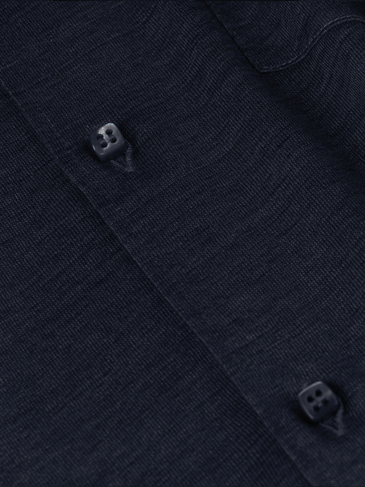 Detail of linen texture on short sleeve blue shirt – 100% Capri